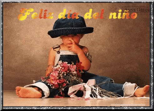 a little boy sitting on the floor with a bouquet of flowers and the words " feliz dia del niño "