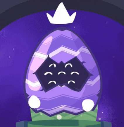 a purple easter egg with a white crown on top of it