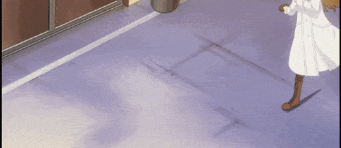 a woman in a white coat and brown boots is running on a sidewalk