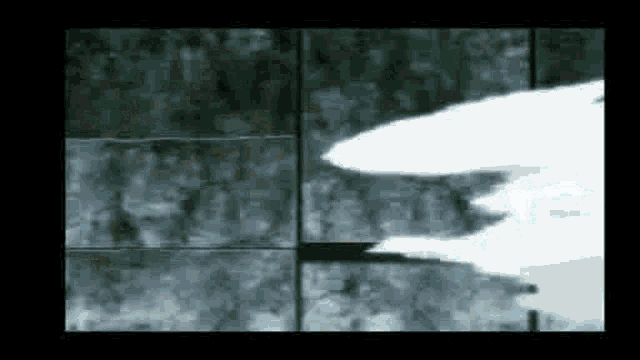 a black and white image of a flying object in the air .