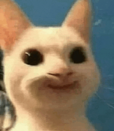 a close up of a cat making a funny face with its mouth open .