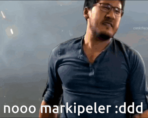 a man wearing glasses and a blue shirt says nooo markipeler : ddd