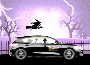 a european on demand car with a witch flying over it