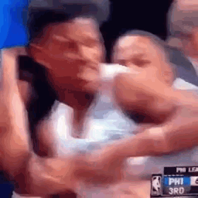 a blurred image of a basketball game between the philadelphia 76ers and the chicago bulls