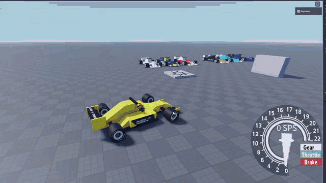 a yellow race car in a video game with a speedometer that says 45 spd