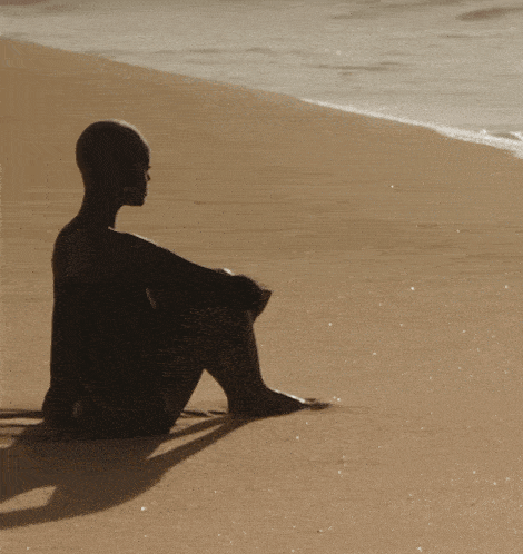a woman 's face is shown in a sepia tone photo