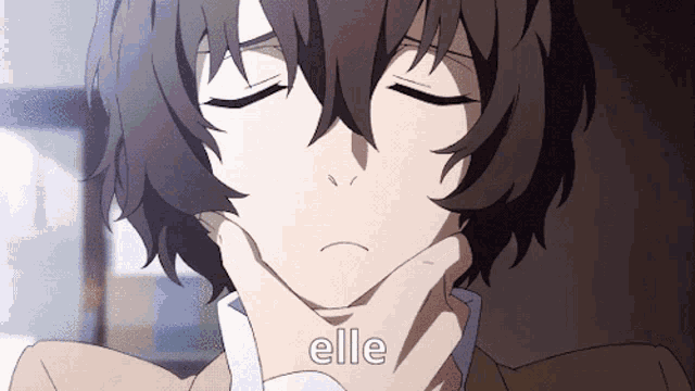 a close up of a person with their eyes closed and the word elle below them