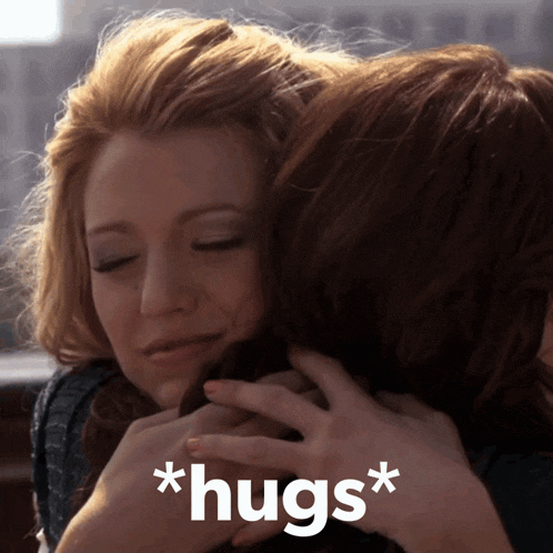 a woman hugging another woman with the words * hugs * written on the bottom