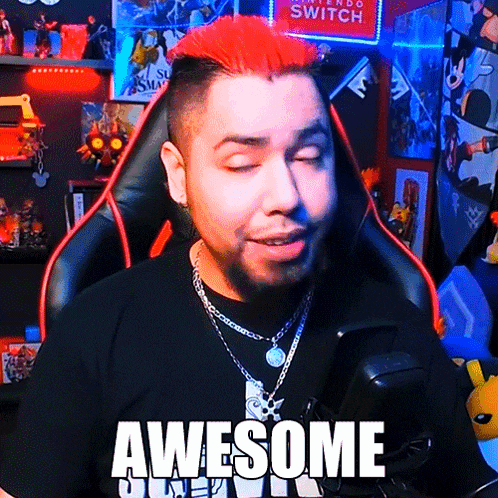 a man with red hair is sitting in front of a sign that says nintendo switch