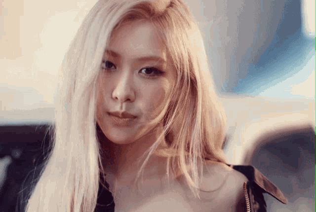 a close up of a woman with blonde hair