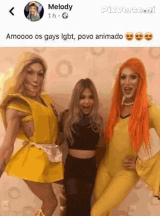 a group of drag queens are posing for a picture .