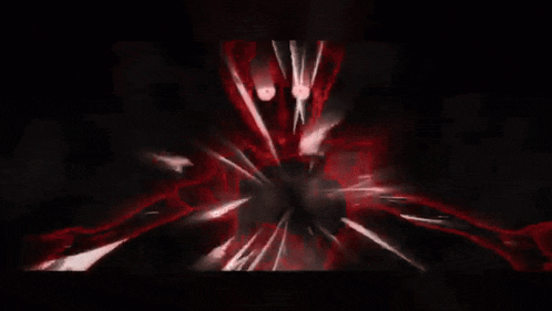 a black background with a red glowing object in the middle .