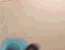 a blurry picture of a person laying on the ground
