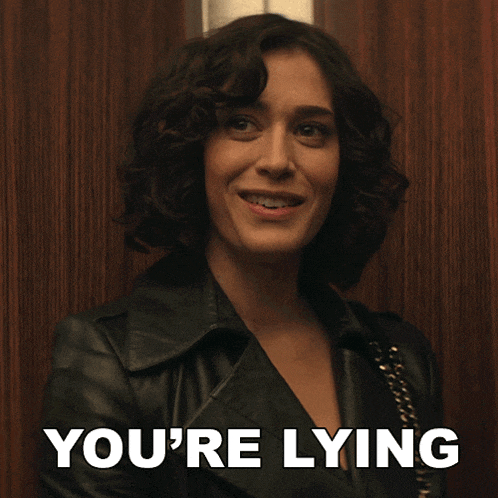 a woman in a leather jacket with the words you 're lying below her