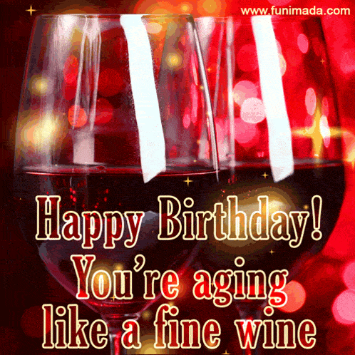 a happy birthday greeting card with two glasses of wine