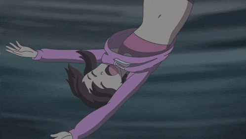 a girl in a purple shirt is laying upside down