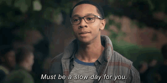 a young man wearing glasses and a plaid shirt says must be a slow day for you .
