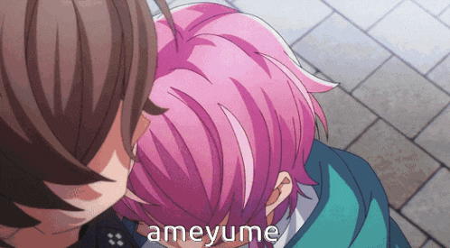 a girl with pink hair is being kissed by a boy with brown hair and the word ameyume is on the bottom