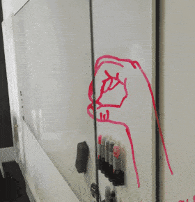 a drawing of a hand pointing at something with red marker