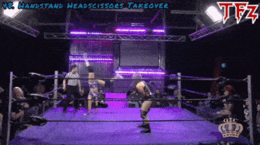 two wrestlers in a ring with a tfz logo above them