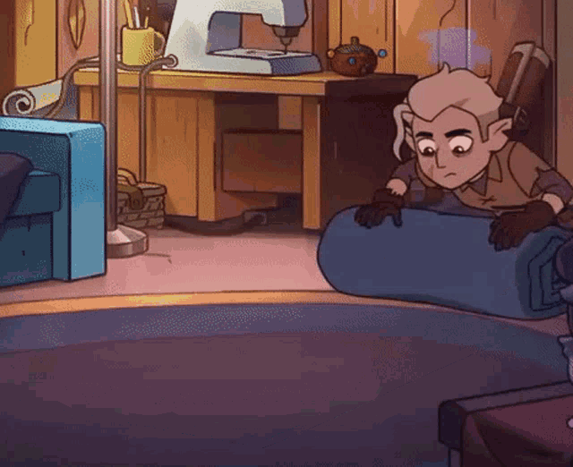 a cartoon character is sitting on a blue couch