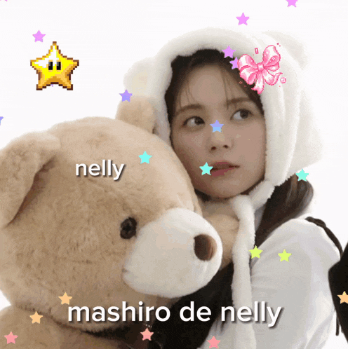 a girl holding a teddy bear with nelly mashiro de nelly written above her