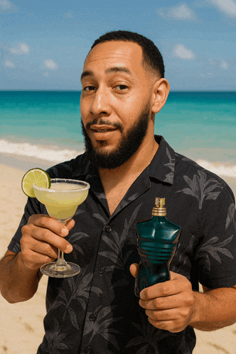 a man holds a margarita and a bottle of perfume