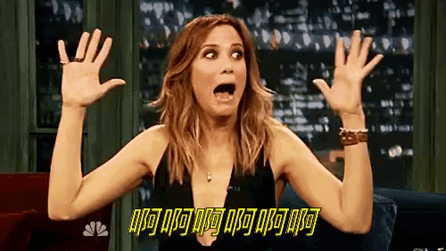 a woman in a black dress is making a surprised face with her hands in the air ..