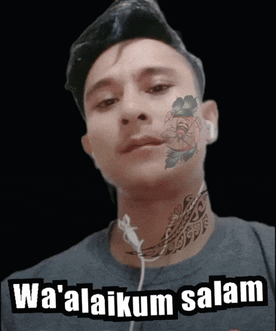 a man with a tattoo on his neck and the words wa ' alaikum salam above him