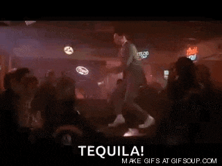 a man is dancing in a bar with the words tequila written on the bottom