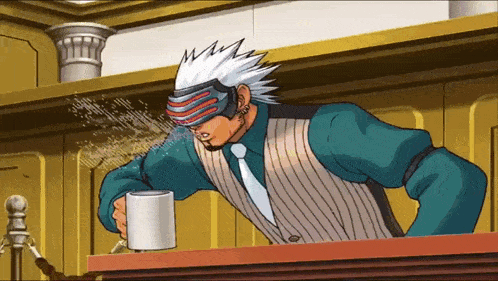 a man in a striped vest and tie is drinking from a white mug