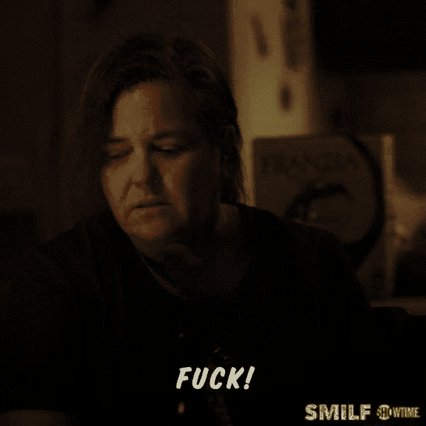 a woman is making a funny face with the words fuck written on the bottom