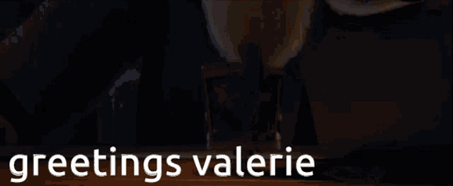 a cartoon character is sitting in a chair with the words greetings valerie written above him