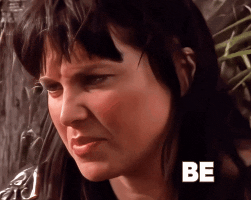 a close up of a woman 's face with the word be in white