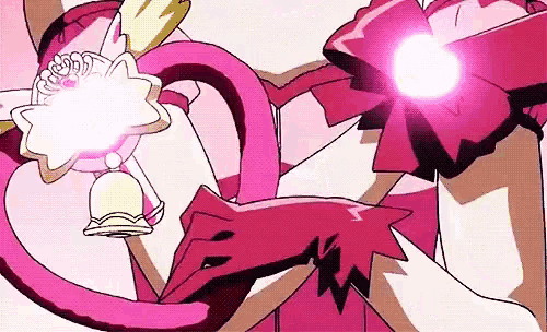 a cartoon character is wearing a pink dress and holding a pink ribbon .