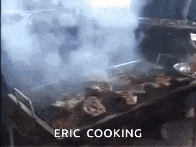 a person is cooking food on a grill with smoke coming out of it and the words eric cooking on the bottom .