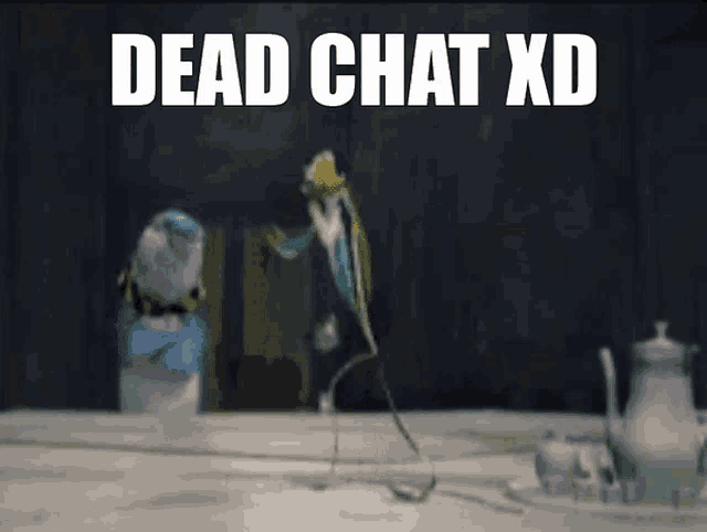two birds are standing on a table with the text dead chat xd