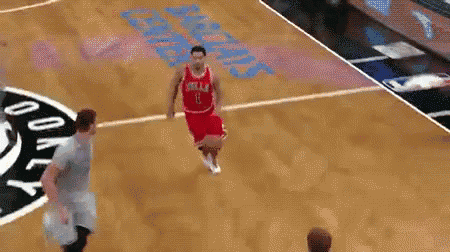 a basketball player in a red jersey with the number 11 on it
