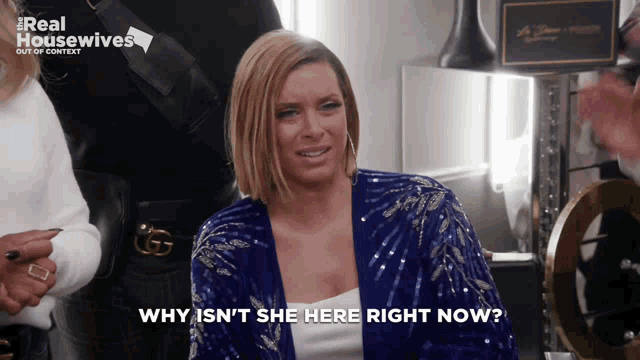 a woman in a blue sequined jacket says why isn 't she here right now