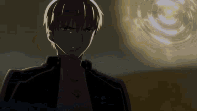 a close up of a person 's face with a light behind him