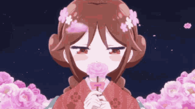 a girl with flowers in her hair is holding a pink flower