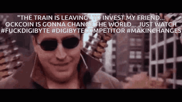 a man wearing sunglasses says " the train is leaving to invest my friend ockcoin is gonna change the world "