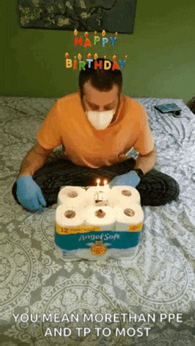 a man wearing a mask is celebrating his birthday with toilet paper rolls
