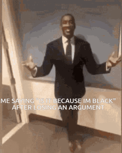 a man in a suit and tie is saying " is it because im black "