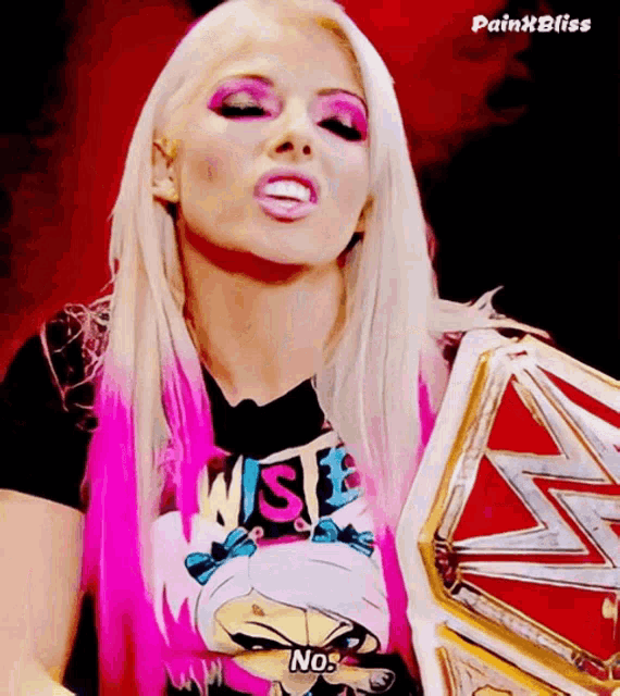 a woman with pink hair and a t-shirt that says wise on it