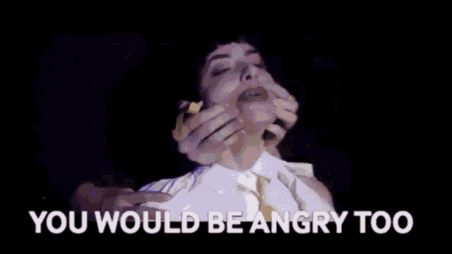 a person is holding a woman 's neck with the words `` you would be angry too '' written above them .