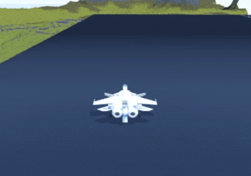 a white jet is sitting on top of a large body of water