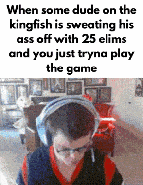 a man wearing headphones is playing a video game