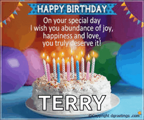 a birthday cake with candles and the name terry