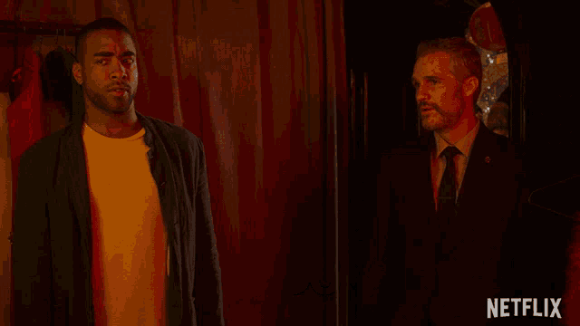 two men are standing next to each other and the word perdon is on the bottom